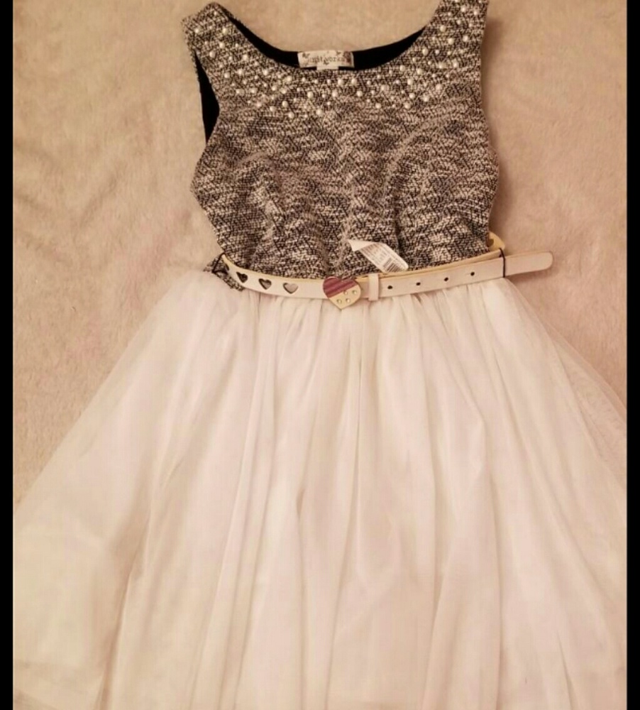 White dress with belt and a heart on it